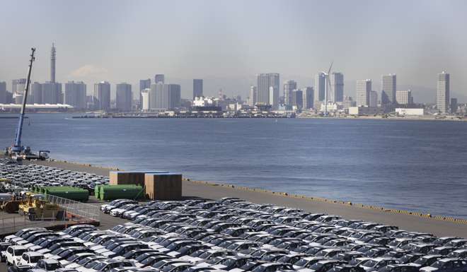 Automaker Fuji Heavy Industries’ Subaru vehicles bound for shipment at a pier in Yokohama, Japan, on January 26. Japanese Prime Minister Shinzo Abe signalled that he is open to a bilateral trade deal with the US after Donald Trump formally withdrew from the 12-nation Trans-Pacific Partnership in one of his first acts as US president. Photo: Bloomberg