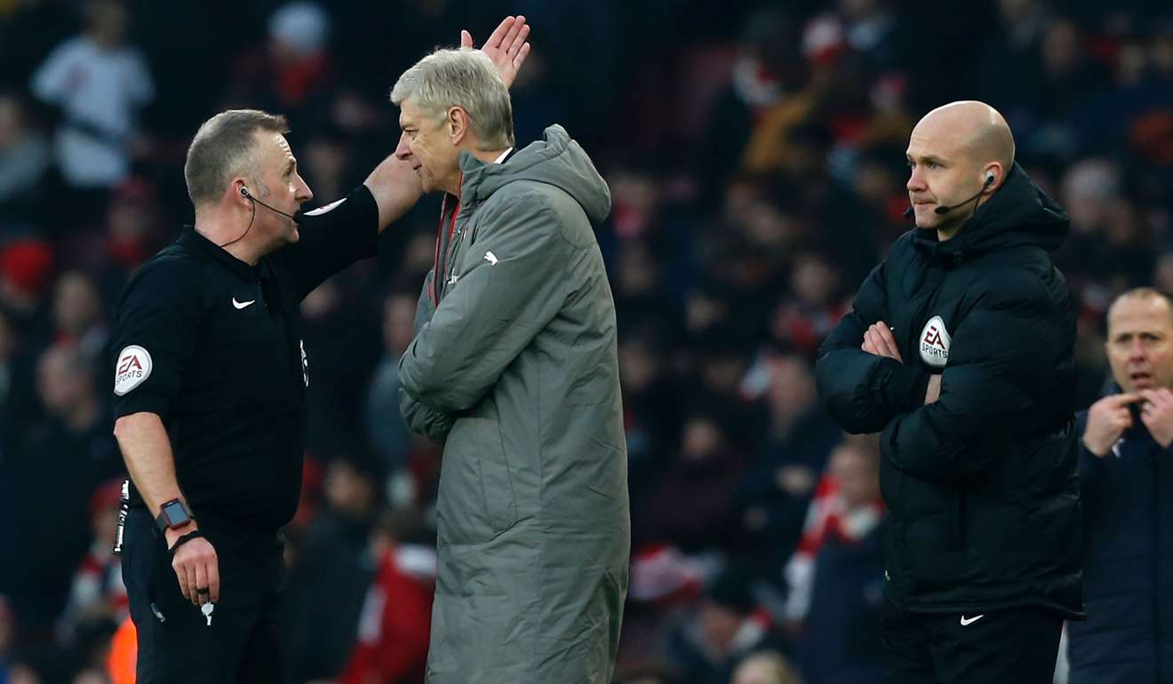 Arsenal manager Arsene Wenger is sent to the stands by referee Jonathan Moss. Photo: AFP