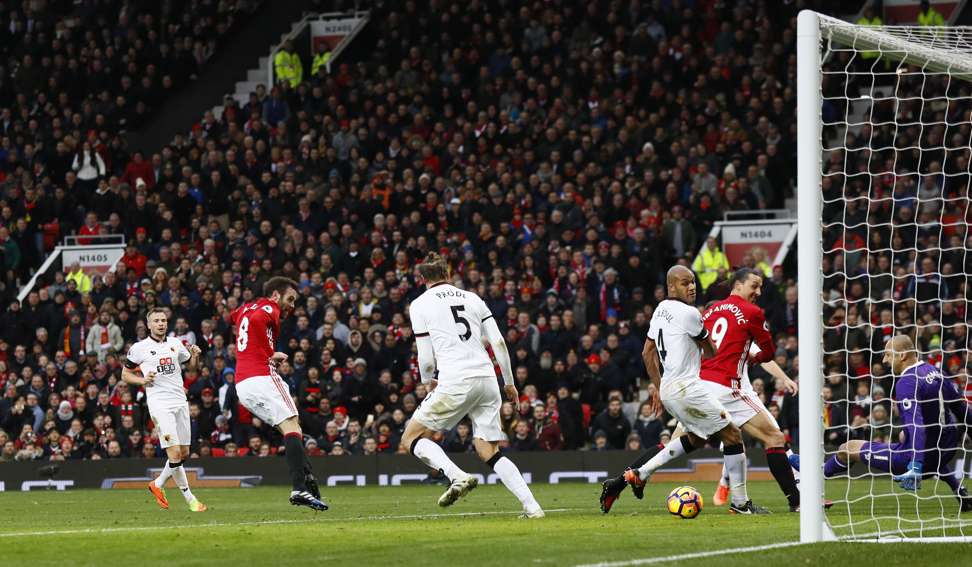 Juan Mata scores Manchester United’s first goal. Photo: Reuters