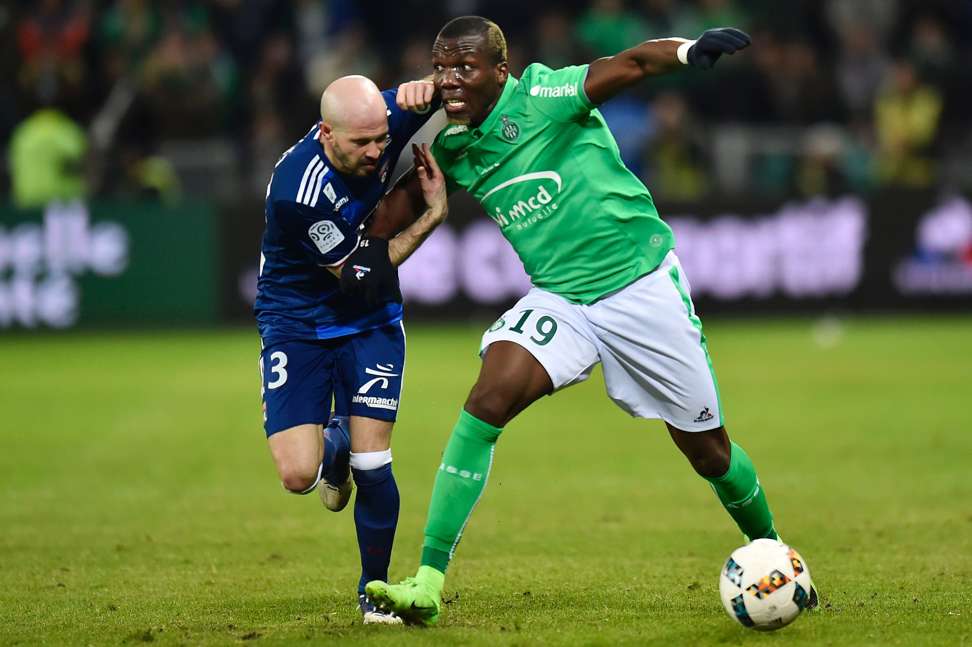Saint-Etienne's French defender Florentin Pogba (right) vies with Lyon's French defender Christophe Jallet. Photo: AFP
