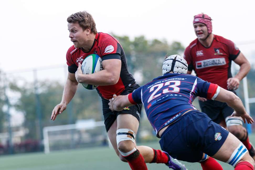 Valley fly half Matt Rosslee takes on the HK Scottish defence.