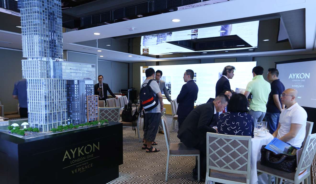 Potential buyers attend the sales office of Aykon London one on June 25, 2016. Photo: Edmond So