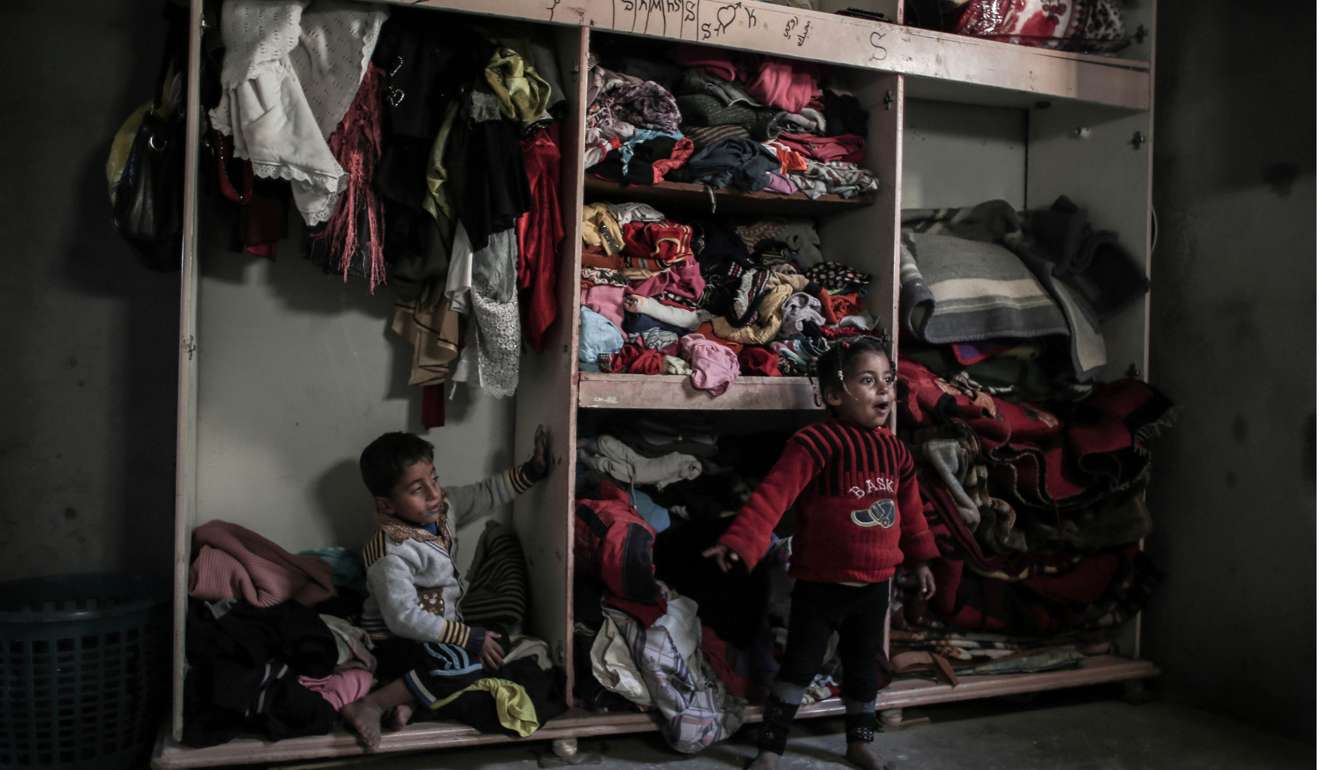 Palestinian children sit inside their house in an impoverished area in the southern Gaza Strip town of Khan Yunis. What the Arab world and the Palestinians fear is that the only result of the new Trump approach will be a lack of pressure on Israel to agree on a compromise deal. Photo: AFP