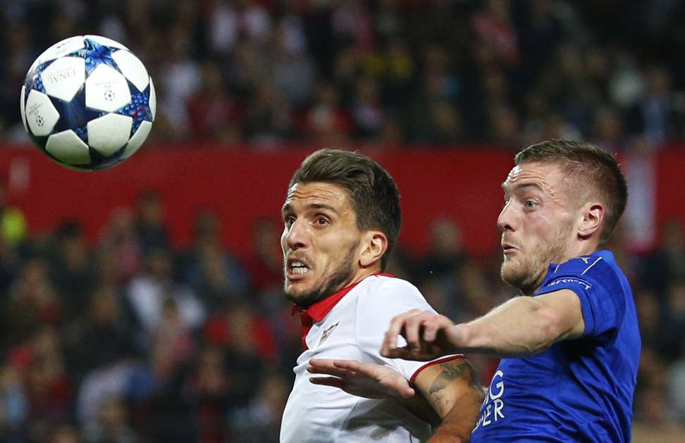 Vardy in action with Sevilla’s Daniel Carrico. Photo: Reuters