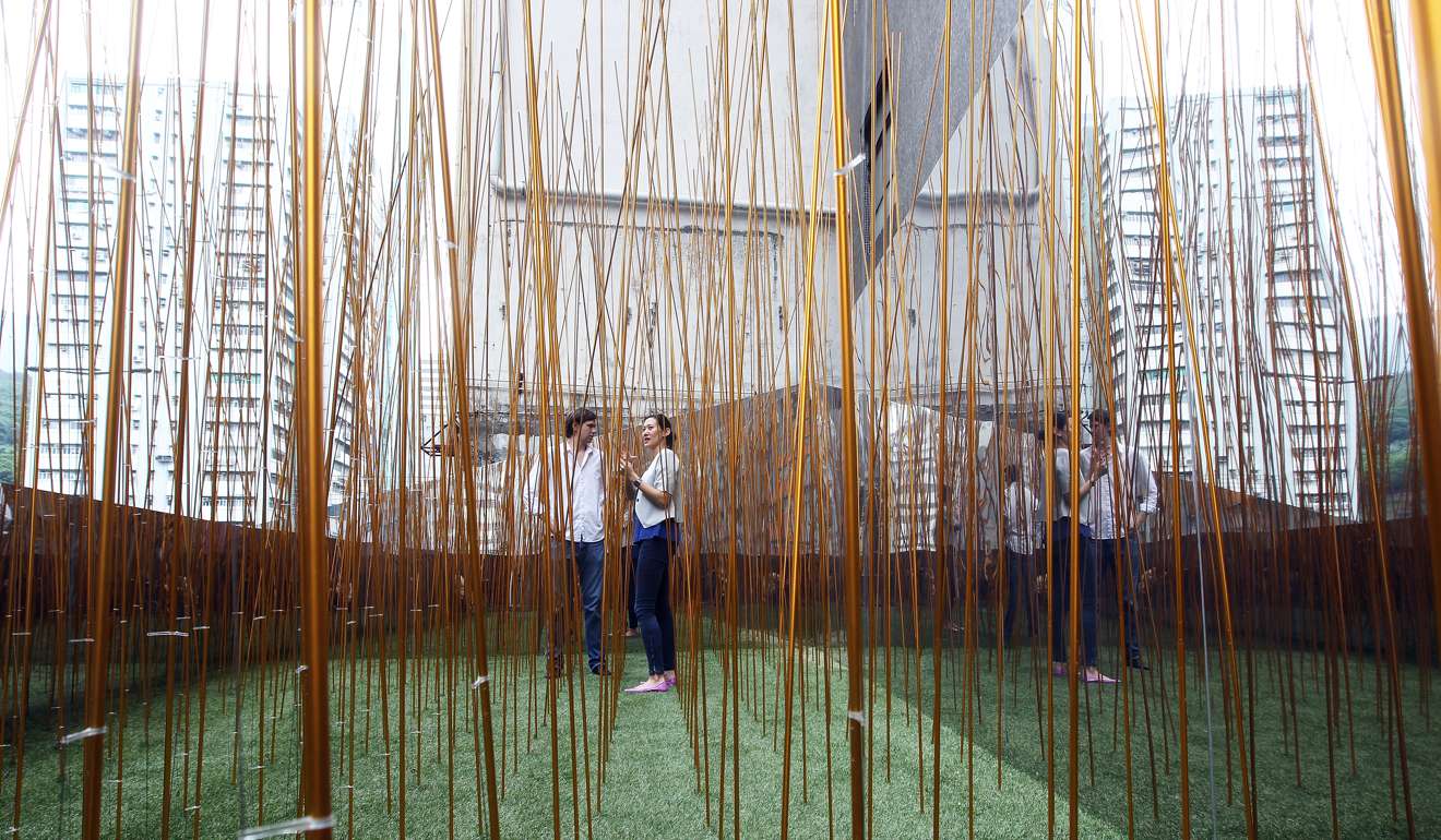 Eric Schuldenfrei and Marisa Yiu Kar-san at their art installation Industrial Forest, one of the first exhibitions at Spring Workshop in 2013. Photo: Jonathan Wong