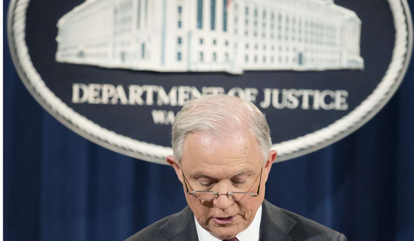 US Attorney General Jeff Sessions holds a news conference in which he recused himself from any current or future investigations into Russia ties to the Trump campaign, at the Justice Department in Washington on Thursday. Photo: EPA