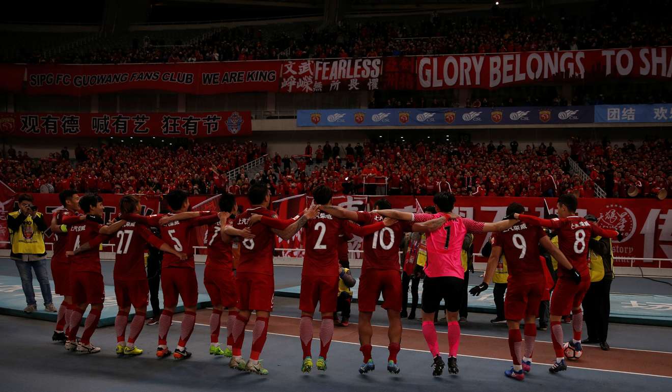 Shanghai SIPG celebrate their victory over Changchun Yatai. Photo: Reuters