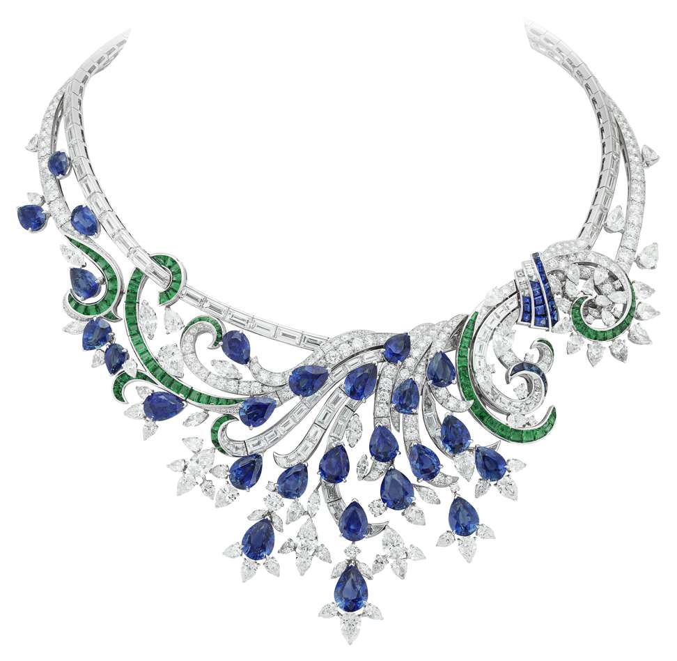 Twenty seven pear-shaped sapphires, emeralds, sapphires, and diamonds are woven together to form this exceptional transformable necklace with detachable clips