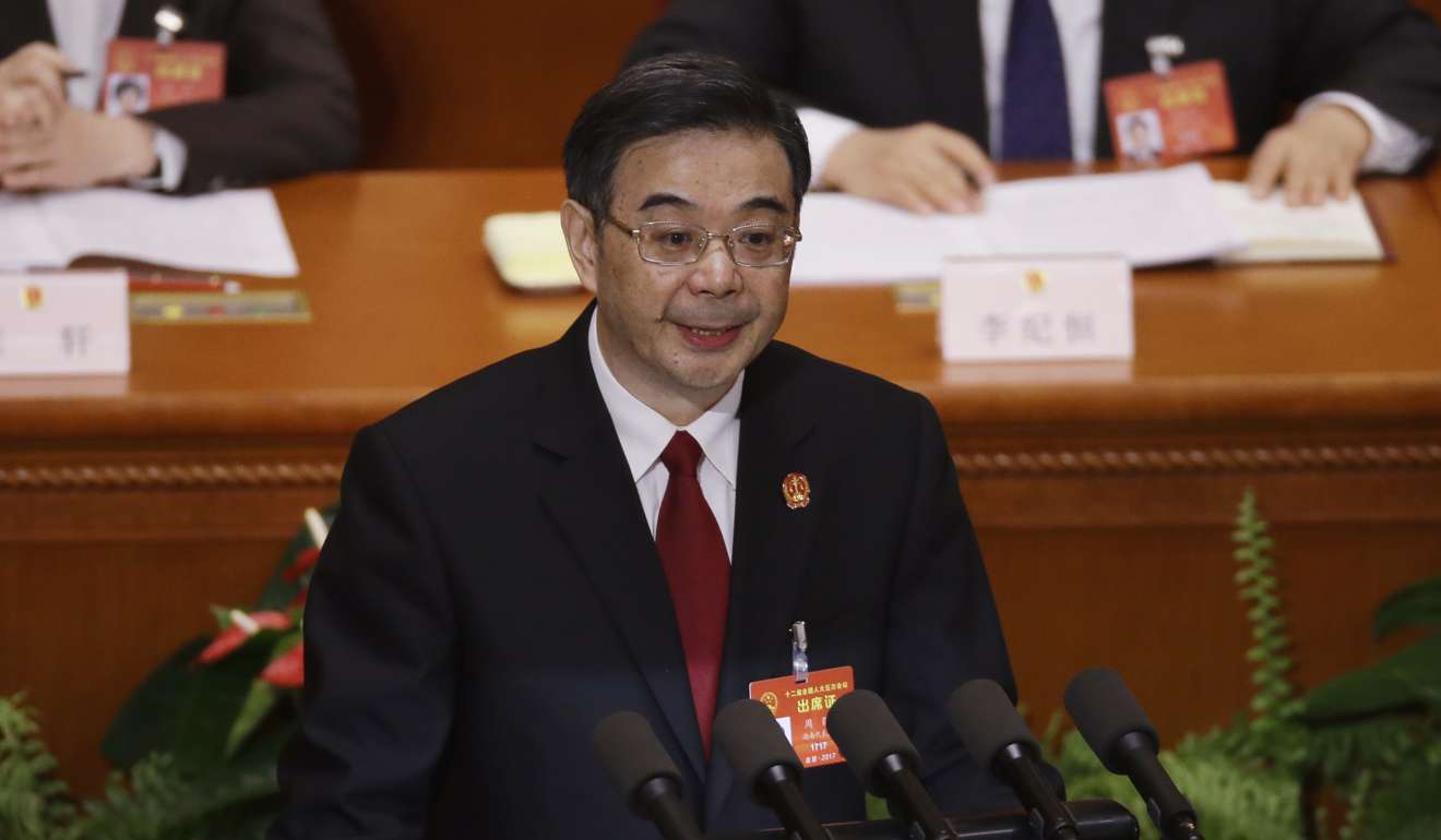 China's top judge, Zhou Qiang, gives his work report on Sunday. Photo: AP