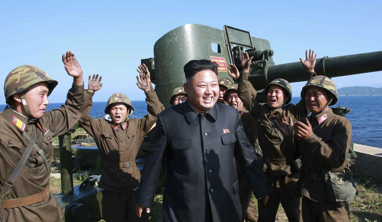 North Korean leader Kim Jong-un surrounded by cheering soldiers. Photo: EPA