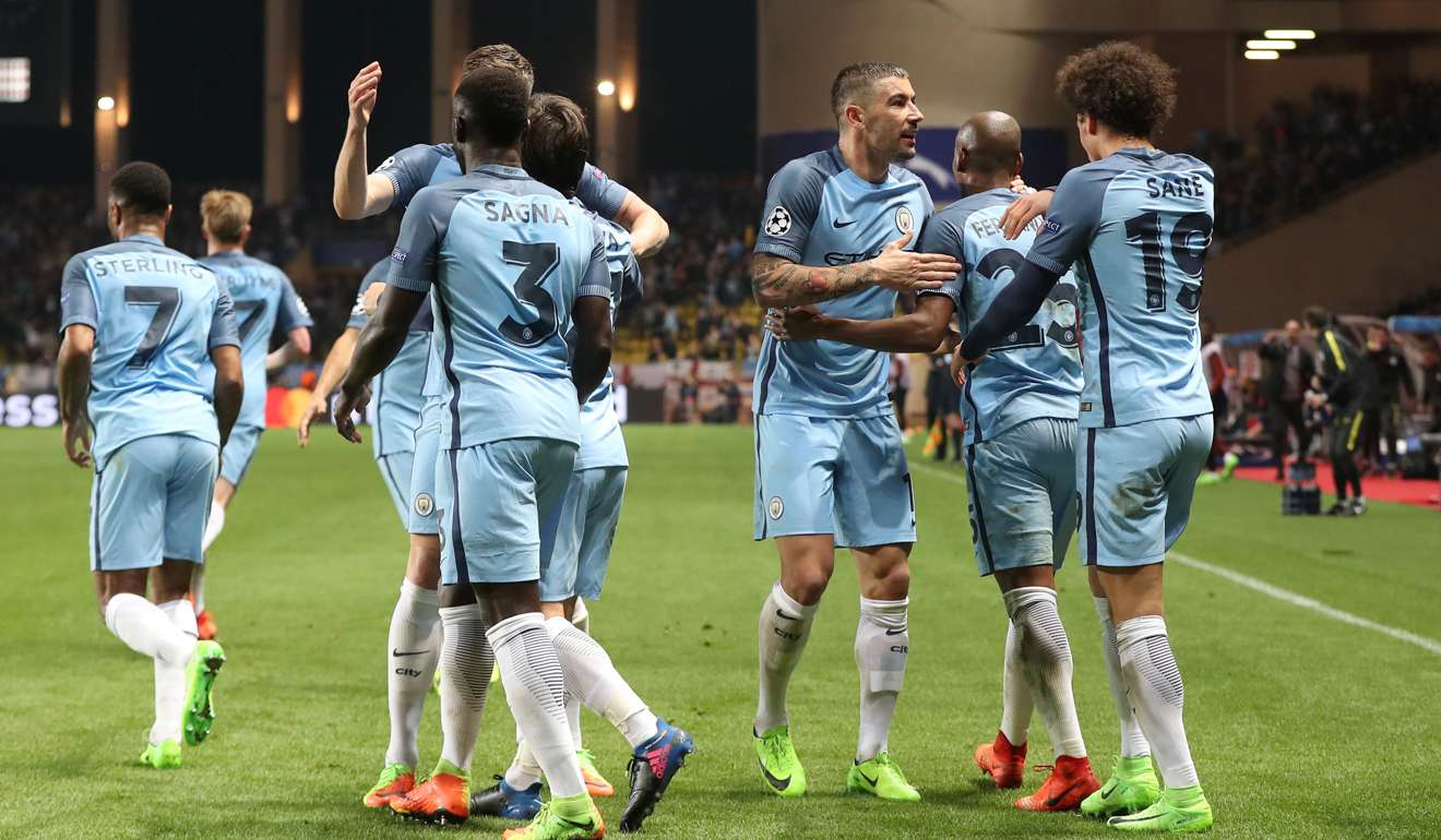 Manchester City's players celebrate after scoring against Monaco. Photo: AFP