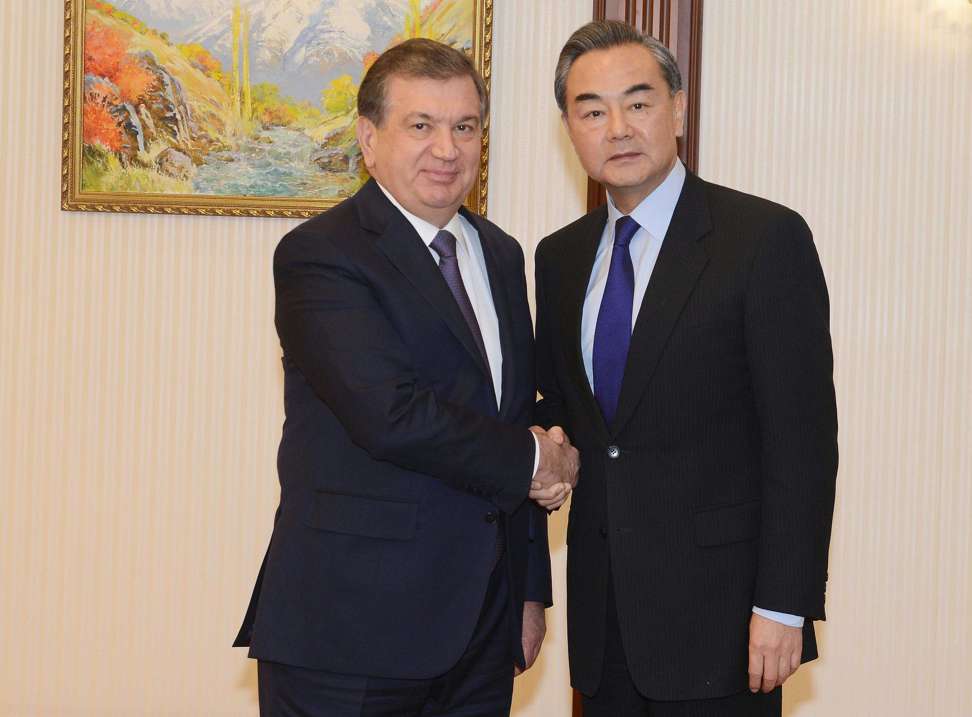 Then acting president Shavkat Mirziyayev of Uzbekistan with visiting Chinese Foreign Minister Wang Yi in Tashkent last November 12. Mirziyayev won a presidential election to succeed the late Islam Karimov the following month. Photo: Xinhua