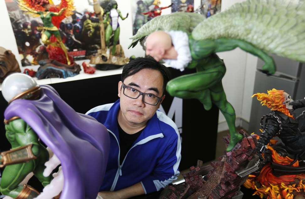 G-Link business development manager Chan York-hall shows off some of his favourite figures. Photo: Xiaomei Chen