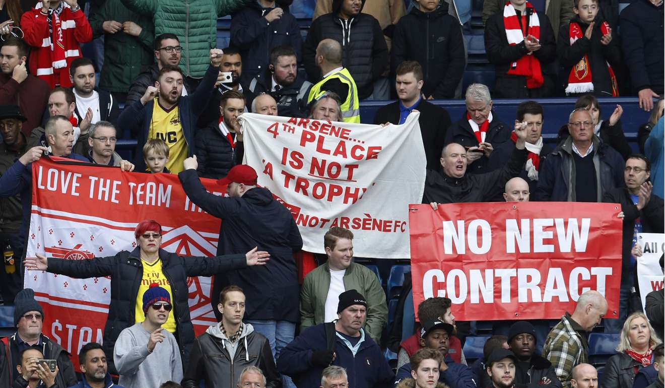 Fans protested Wenger at the game. Photo: Reuters