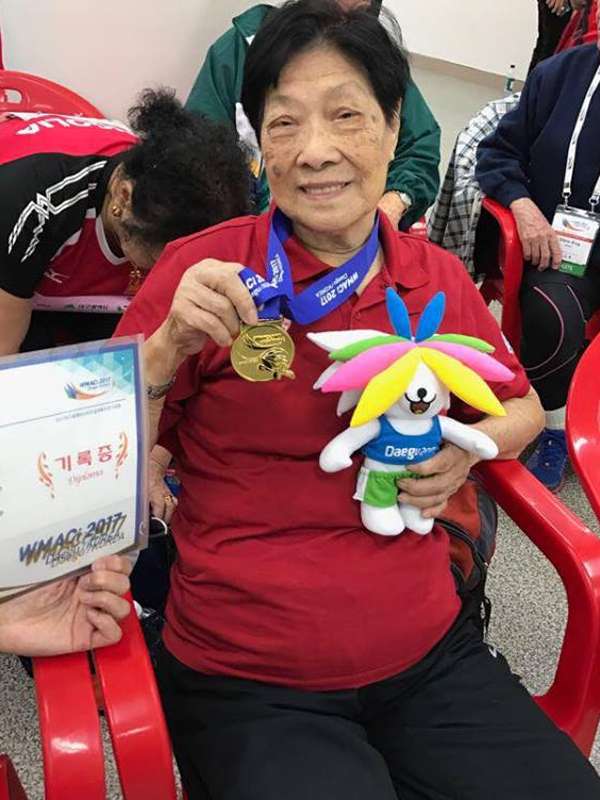 Cheung with her medal.