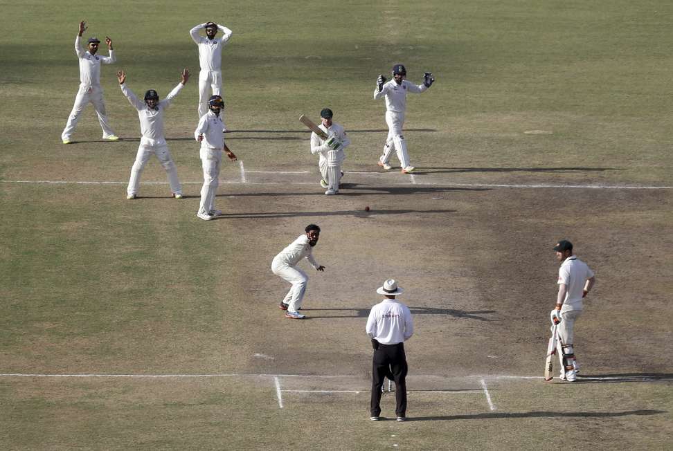 India’s players appeal unsuccessfully for the dismissal of Australia’s Peter Handscomb during the third test. Photo: AP