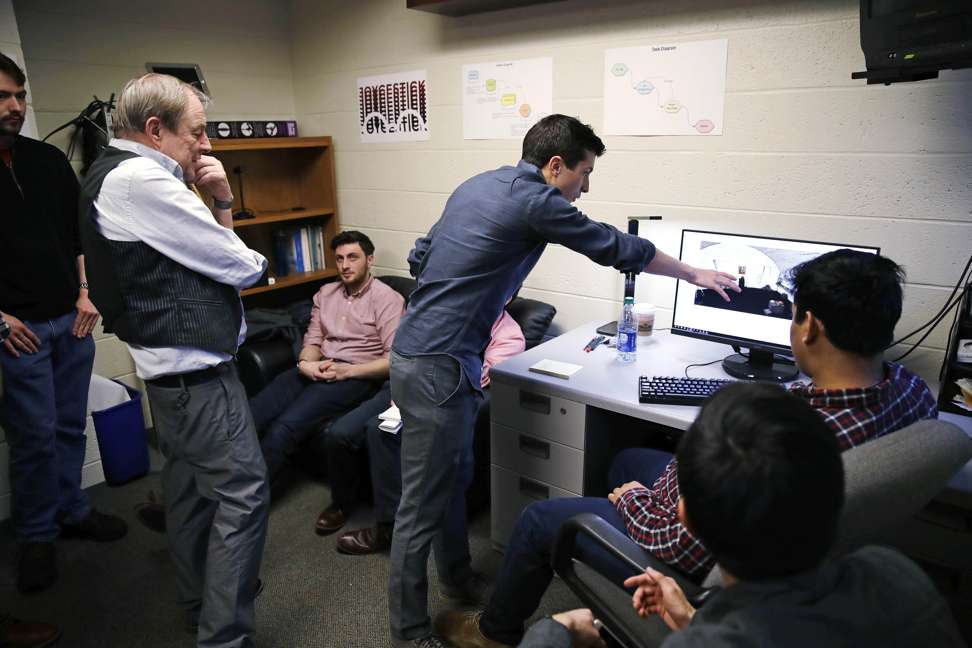 Professor Joseph Nugent oversees students working on a new virtual reality game based on James Joyce’s Ulysses. Photo: AP