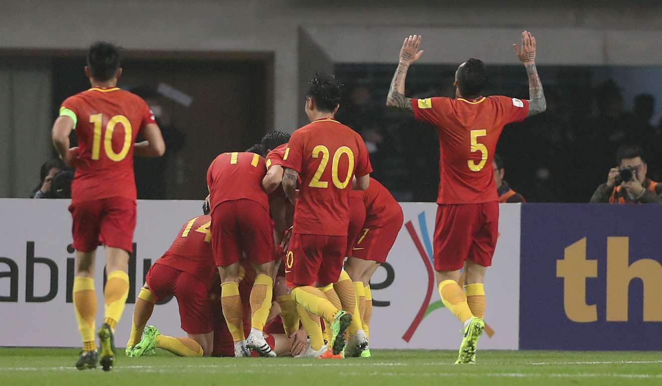 China celebrate Yu Dabao's goal against South Korea. Photo: Xinhua