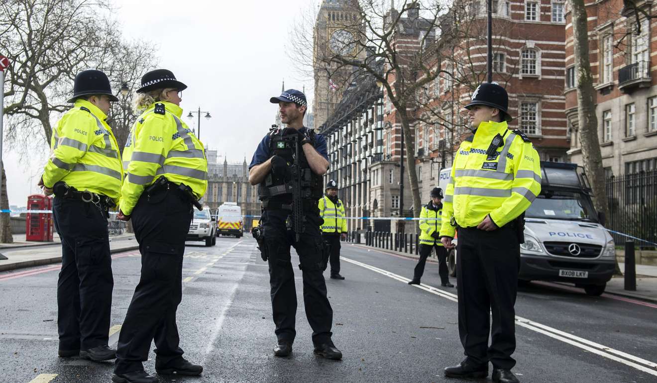 Police officers on duty during the lockdown in the Whitehall area of central London. Photo: EPA