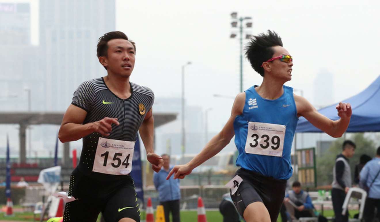 Tsui Chi-ho (left) beats Wan Hin-chung in the men’s 100m final. Tsui clocked 10.67 seconds.