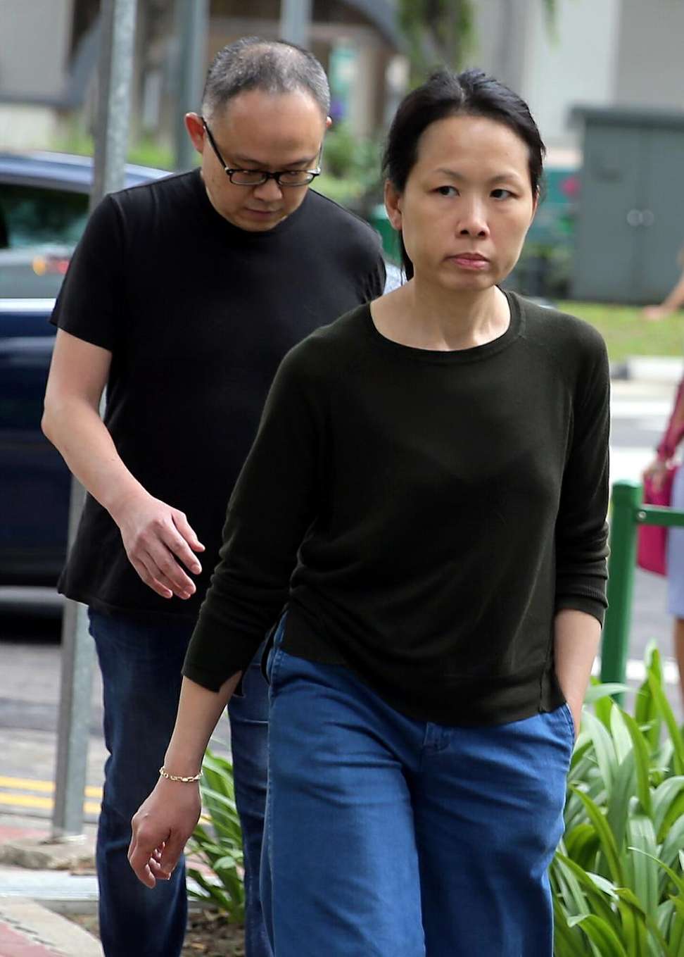 Trader Lim Choon Hong and his wife Chong Sui Foon arriving at the state court in Singapore. Photo: AFP