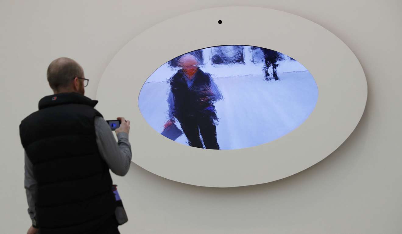 A visitor looks at Mirror No. 12 by Daniel Rozin during a press day to promote the upcoming exhibition From Selfie to Self-Expression at the Saatchi Gallery in London. Photo: Reuters