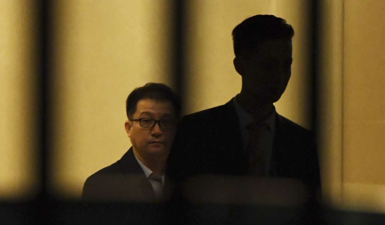 A North Korean official walks through the VIP entrance at Beijing airport early on Friday after arriving from Malaysia. Photo: AFP