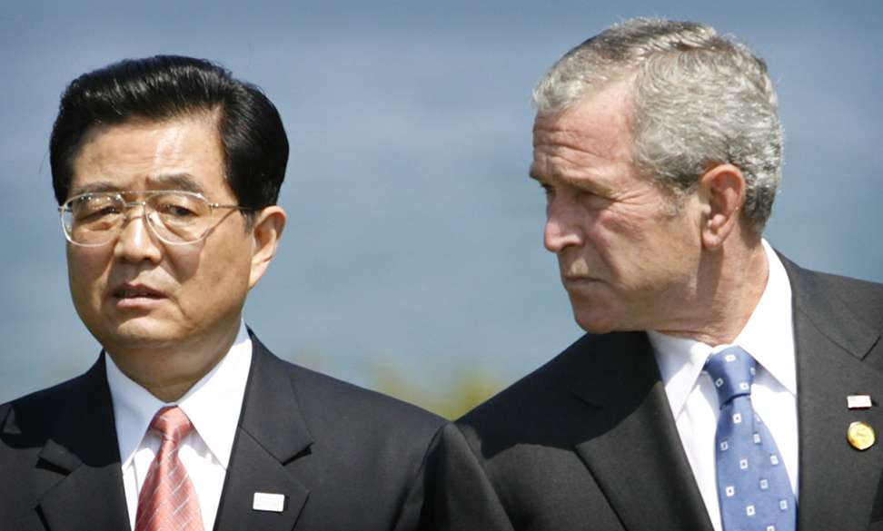 US president George W. Bush looks towards Chinese president Hu Jintao during a group photo at the G8 summit in Heiligendamm, Germany, in June 2007. Photo: Reuters