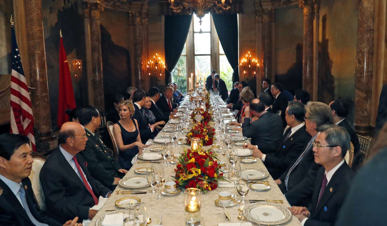 Both entourages at the dinner table at Trump’s estate. Photo: AP