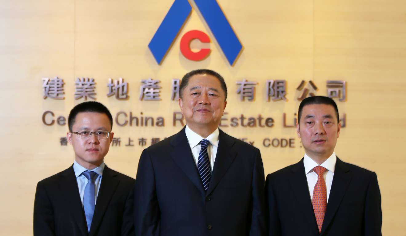 From left, Central China Real Estate’s chief financial officer Hu Ping; chairman Hu Baosen; and chief executive officer Yuan Xujun. Photo: David Wong