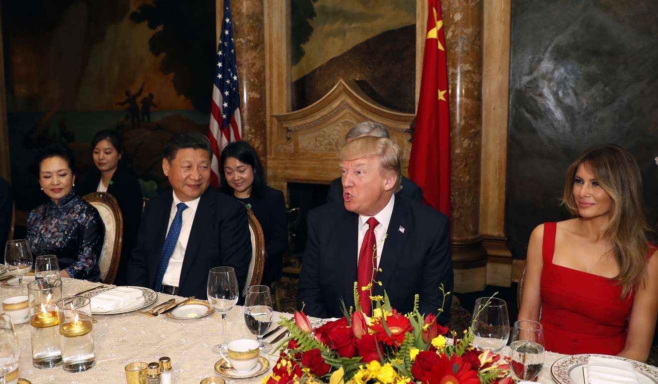 President Donald Trump and Chinese President Xi Jinping, with their wives, first lady Melania Trump and Chinese first lady Peng Liyuan are seated during a dinner at Mar-a-Lago last week. Photo: AP
