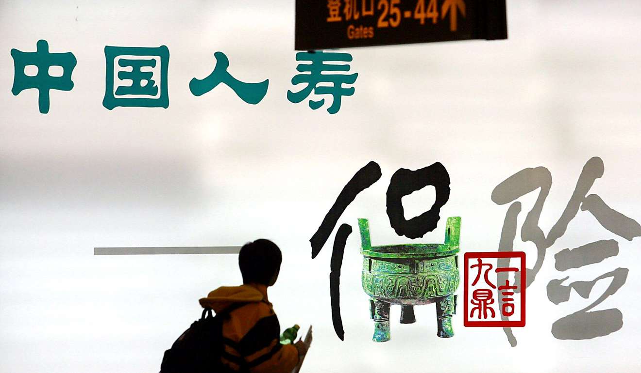 An advert for China Life Insurance, China's largest life insurer, at Beijing airport. Photo: AFP