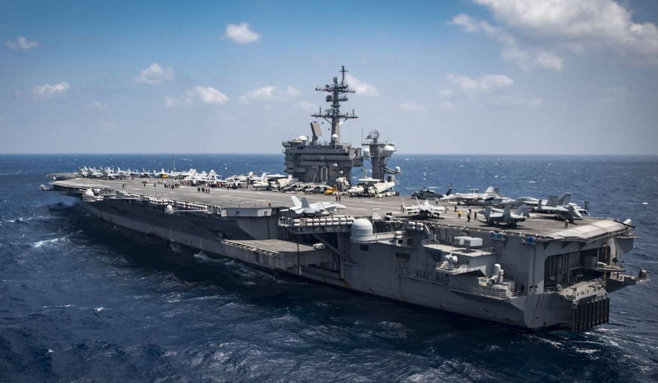 The USS Carl Vinson aircraft carrier transits the South China Sea on March 2. The warship set sail for the Korean peninsula in early April at the head of a US Navy strike group, including a guided-missile cruiser and two destroyers, in a show of force against North Korea’s “reckless” nuclear weapons programme. Photo: AFP