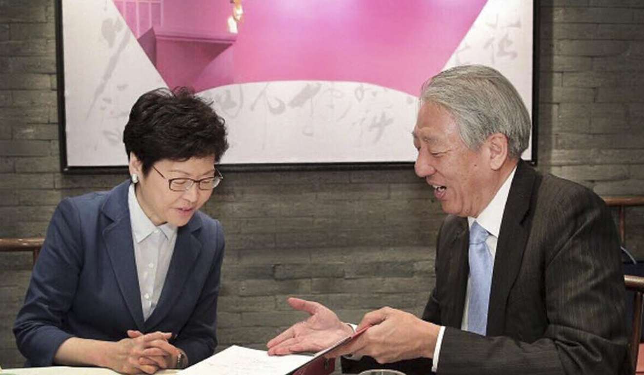 Hong Kong’s chief executive-elect Carrie Lam meets Teo Chee Hean during his two-day visit. Photo: Facebook