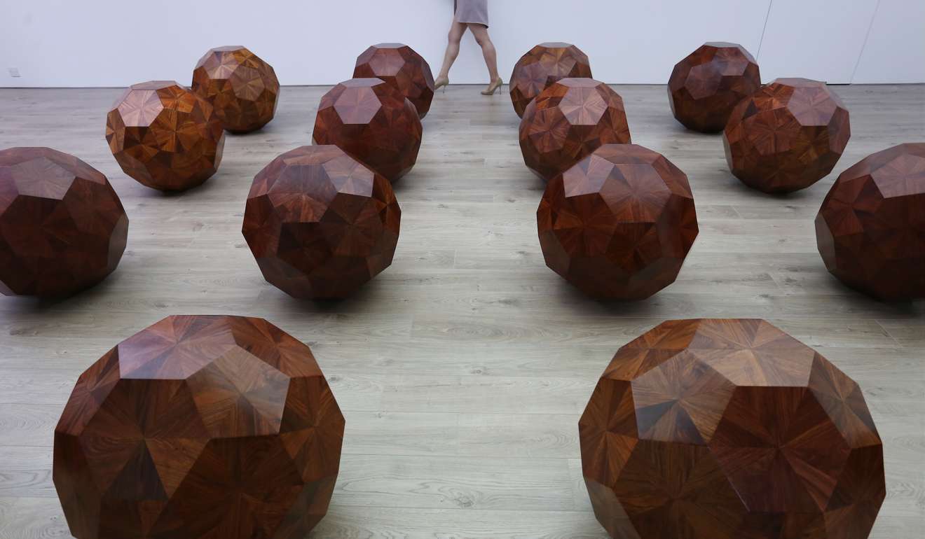 Untitled (Wooden Ball) by Ai Weiwei displayed in Hong Kong at Tang Contemporary Art in Central in 2015. Photo: Jonathan Wong