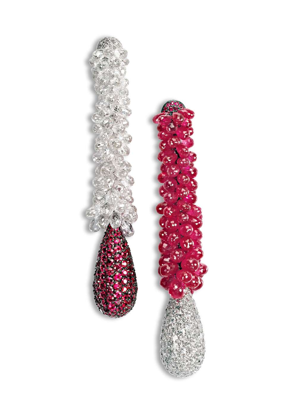 The 18 ct white gold earrings set with diamonds and rubies play with the contrasting colours of the gemstones to create a modern statement. Price on request