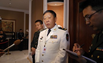 Rear Admiral Guan Youfei, director of the Foreign Affairs Office under the Central Military Commission, talked to overseas media during Saturday’s presser at the sideline of Shangri-La Dialogue. Photo: Minnie Chan
