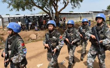 Chinese peacekeepers on patrol at the United Nations House in Juba, South Sudan this month. Photo: Xinhua