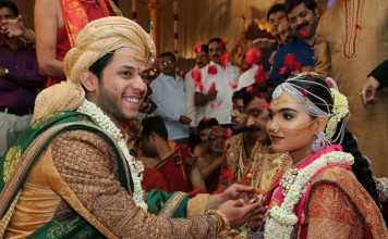 Daughter of Gali Janardhan Reddy, Bramhani (right) sits with her groom, Rajeev Reddy during their wedding at the Bangalore Palace Grounds in Bangalore. Photo: AFP/Janardhana Reddy family