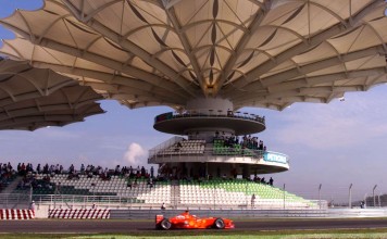 Eddie Irvine on his way to victory in the inaugural Malaysian Grand Prix in 1999. Photo: Reuters