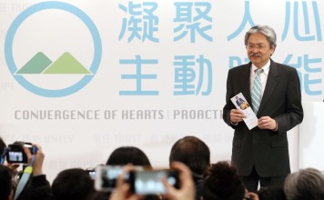 Launching his manifesto, former financial secretary also vows to revisit national security bill which saw half a million take to streets in 2003