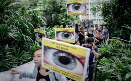 Protesters supporting Edward Snowden march to the US consulate in Hong Kong during the early days of his stay in the city. Photo: AFP