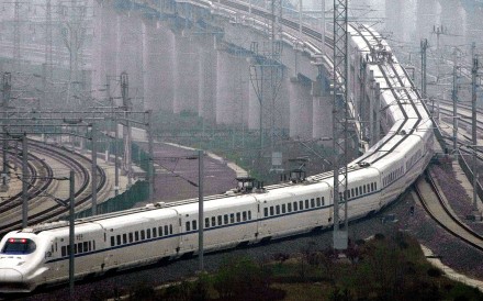 A train which can run at speeds up to 300 kilometres (185 miles) per hour goes on a trial run in Shanghai on May 11, 2011. Trial runs began on the highly anticipated high-speed rail line between Beijing and Shanghai, one month before the link is due to go into commercial service, state media reported. CHINA OUT AFP PHOTO