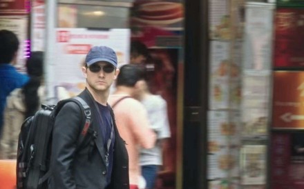 <p>First look at film about the US covert surveillance whistle-blower suggests it is slick and stylish, though Nicolas Cage’s turn as a government official puts a dent in its credibility</p>