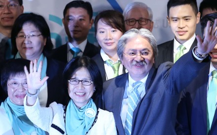 John Tsang, with his wife Lynn Tsang Wong Lynn-wah, at a press conference to declare his candidacy for the chief executive race. Photo: K. Y. Cheng
