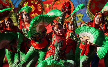 Dancers in traditional costume perform at Longtan Park in Beijing as part of festivities to mark the New Year, also called the Spring Festival in China, on January 30. Photo: EPA