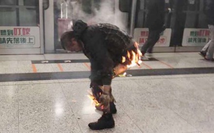 Image result for Man arrested after firebomb attack on Hong Kong MTR train injures at least 18