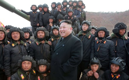 An undated photograph shows North Korean leader Kim Jong-un reviewing his army’s tank crews. Photo: EPA