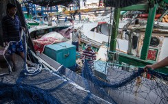 Filippino fishermen at Nanfangao harbour near Yilan, Taiwan. Pictures: Paul Ratje
