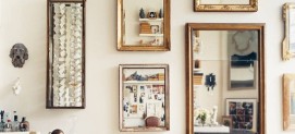 Mirrors in frames of varying shapes and sizes make an eye-catching gallery Mirrors in frames of varying shapes and sizes make an eye-catching gallery